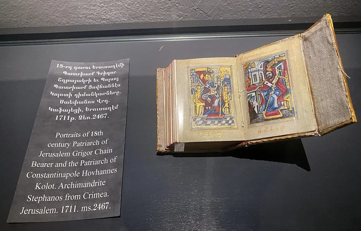 Armenian manuscript on display — Roded Shlomo Pikiwiki Israel, CC BY 2.5 (https://creativecommons.org/licenses/by/2.5/). https://commons.wikimedia.org/wiki/File:114697_the_armenian_museum-jerusalem_PikiWiki_Israel.jpg